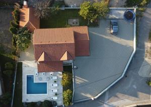 an overhead view of a roof of a house with a pool at Relax House Nizic in Dražice