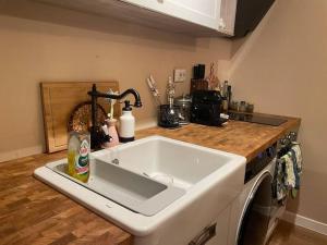 a kitchen with a sink and a counter top at Annabella’s place in Veliko Tŭrnovo
