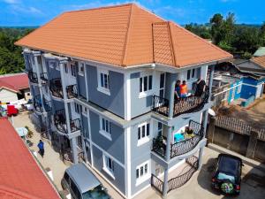 an overhead view of a house with an orange roof at Frankfurt Cottages in Mbale