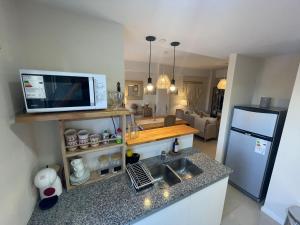 A kitchen or kitchenette at PASO SQUARE