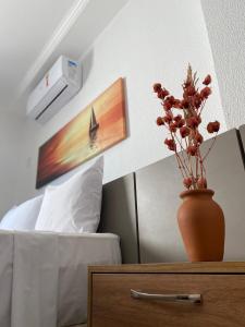 Postel nebo postele na pokoji v ubytování Pousada Cantinho da Barra
