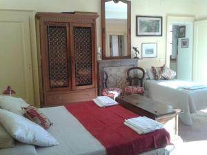 Säng eller sängar i ett rum på Giò's House vintage style