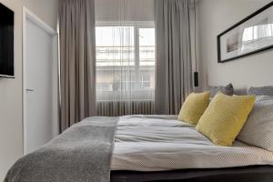 Postel nebo postele na pokoji v ubytování NN Urban Guesthouse