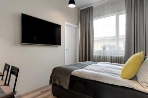 Postel nebo postele na pokoji v ubytování NN Urban Guesthouse