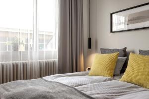 Postel nebo postele na pokoji v ubytování NN Urban Guesthouse