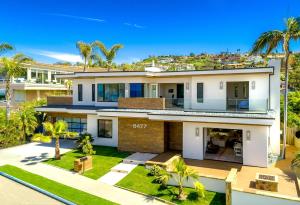 an aerial view of a house with palm trees at Dolphin Sunset in San Diego