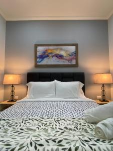 Postel nebo postele na pokoji v ubytování Cal Bed & Breakfast