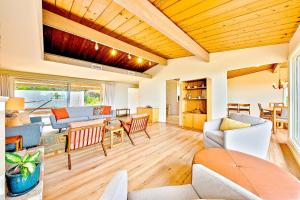 a living room with a couch and a table at La Jolla Lookout in San Diego