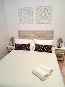 A bed or beds in a room at El Rinconcito de Noa