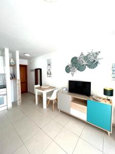 TV a/nebo společenská místnost v ubytování Sun Beach 89 + 14 fotografií