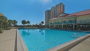 a large swimming pool in front of a building at Santa Rosa Dunes 1063 in Pensacola Beach