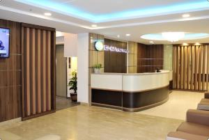 a lobby with a reception desk in a building at ECO HOTEL at BUKIT BINTANG in Kuala Lumpur