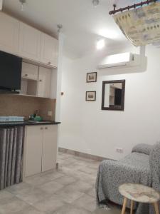 Kuhinja oz. manjša kuhinja v nastanitvi Malaga Ensuites City Centre