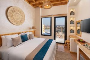 Postel nebo postele na pokoji v ubytování Benben by Dhara Hotels - Adults Only + 37 fotografií