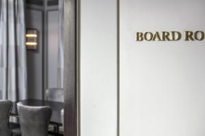a door with a sign that reads board room at The Norman Tel Aviv in Tel Aviv