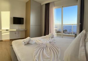 Katil atau katil-katil dalam bilik di Suite Hotel