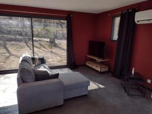 TV a/nebo společenská místnost v ubytování Gîte Nature et Calme du Travers