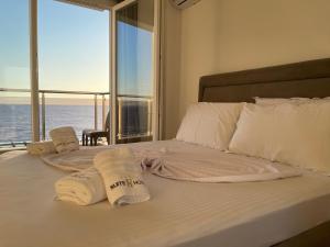 Katil atau katil-katil dalam bilik di Suite Hotel
