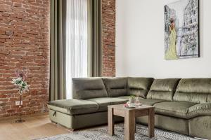 Posezení v ubytování Ultra Central - Luxurious Retreat + 18 fotografií