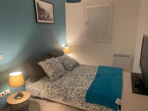 Posteľ alebo postele v izbe v ubytovaní Charmant Appartement Cosy sur Sète proche de toutes commodités, Parking Privé