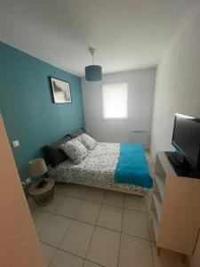 Posteľ alebo postele v izbe v ubytovaní Charmant Appartement Cosy sur Sète proche de toutes commodités, Parking Privé