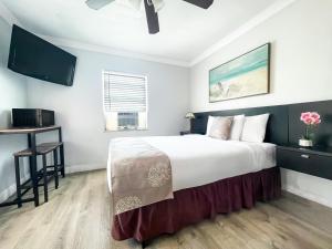 מיטה או מיטות בחדר ב-Ocean Villas