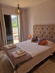 Postel nebo postele na pokoji v ubytování Lovely Apartment Funchal