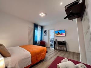 TV a/nebo společenská místnost v ubytování verona rooms 109