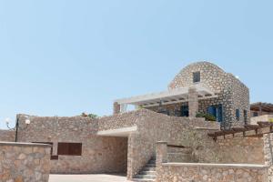 Foto dalla galleria di Red Cliff Santorini Villa - Volcano View & Jacuzzi ad Akrotírion