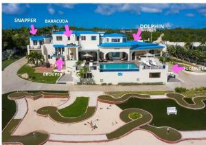 una vista aérea de una casa grande con piscina en Anguilla - Villa Anguillitta villa, en Blowing Point Village