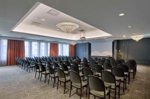 a large room with a bunch of chairs in it at Scandic Grand Hotel in Örebro