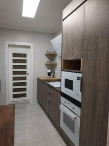 Kuchyň nebo kuchyňský kout v ubytování Hermoso Apartamento en Benicasim