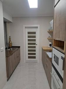 Kuchyň nebo kuchyňský kout v ubytování Hermoso Apartamento en Benicasim