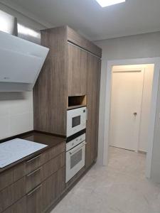 Kuchyň nebo kuchyňský kout v ubytování Hermoso Apartamento en Benicasim