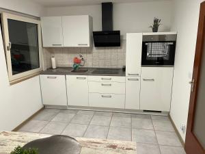 Η κουζίνα ή μικρή κουζίνα στο A&V Apartments Sweet Home