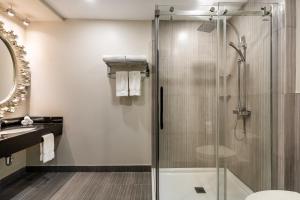 Koupelna v ubytování Empire Suites