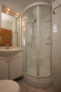 a bathroom with a shower and a sink at Rooms by the sea Vis - 3034 in Vis