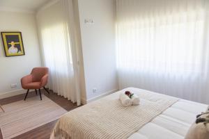 Postel nebo postele na pokoji v ubytování Rota VMF - Alcobaça