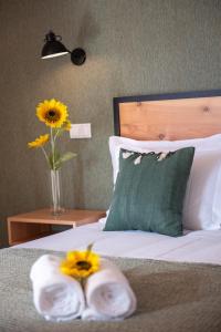 Un pat sau paturi într-o cameră la Rota VMF - Alcobaça