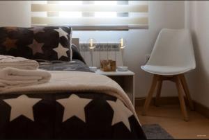 Cama o camas de una habitación en A los Ojos del Río Duero
