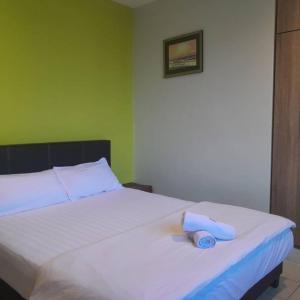 Postel nebo postele na pokoji v ubytování Reintree Lodge Hotel