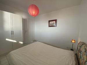 Posteľ alebo postele v izbe v ubytovaní Appartement 4 pers avec vue mer, face à la plage - FR-1-709-33