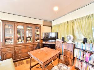 TV a/nebo společenská místnost v ubytování Kurumayama Kogen Guesthouse Urara