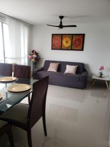 a living room with a couch and a table at Hermoso apartamento para estrenar en Valle de Lili in Nariño