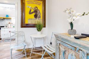 a kitchen with a picture of a monkey on the wall at Seagrass Suite in Key West