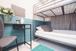 Postel nebo postele na pokoji v ubytování Miyako Shinjuku Hotel 都-新宿-