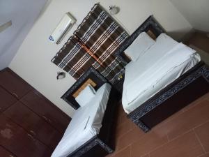 Lova arba lovos apgyvendinimo įstaigoje Al Rehman guest hous