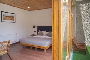 The Dunes Boutique Hotel客房内的一张或多张床位