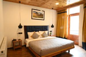 The Dunes Boutique Hotel客房内的一张或多张床位