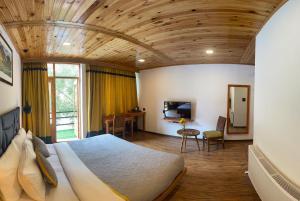 The Dunes Boutique Hotel的电视和/或娱乐中心